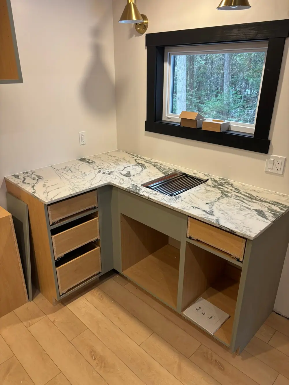 Green and white veined stone countertop